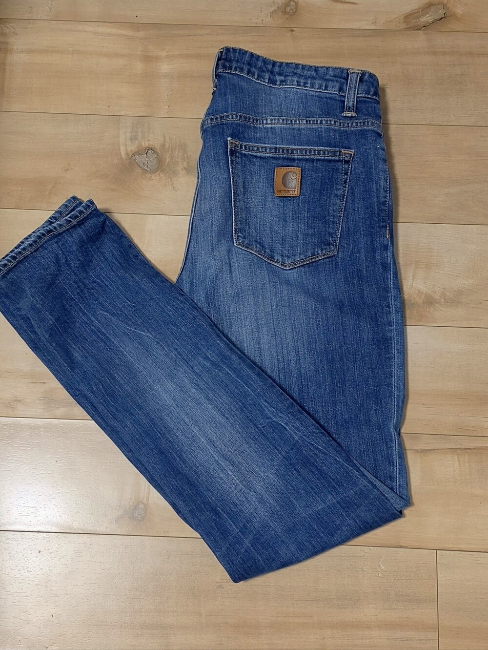 Carhartt Dark Blue Denim Jeans with Brown Leather Patch